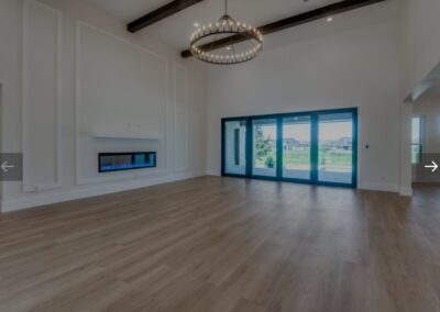 An empty hall with a beautiful chandelier