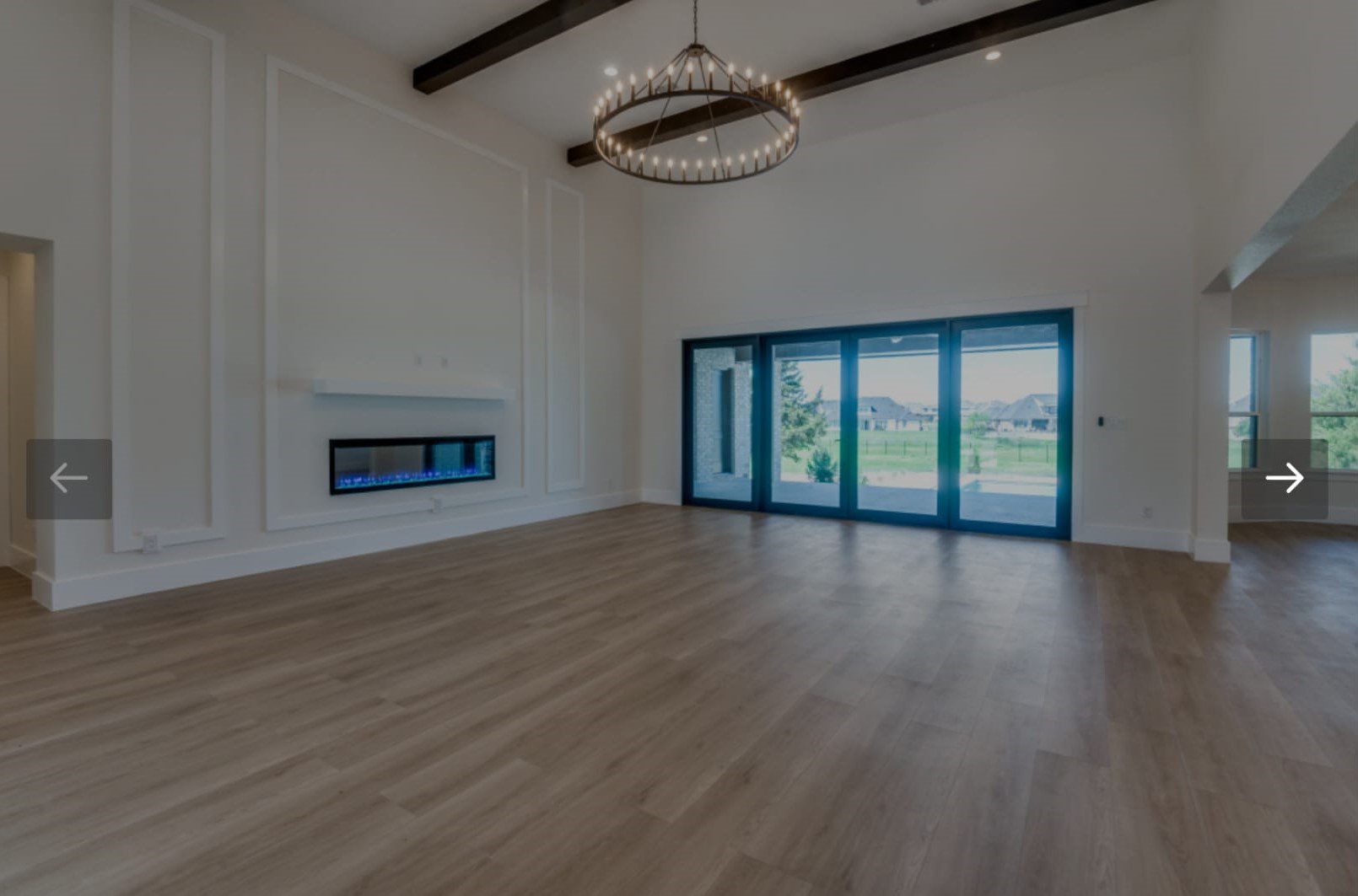 An empty hall with a beautiful chandelier