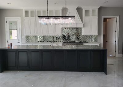 A black color woodern cuboard set in the kitchen